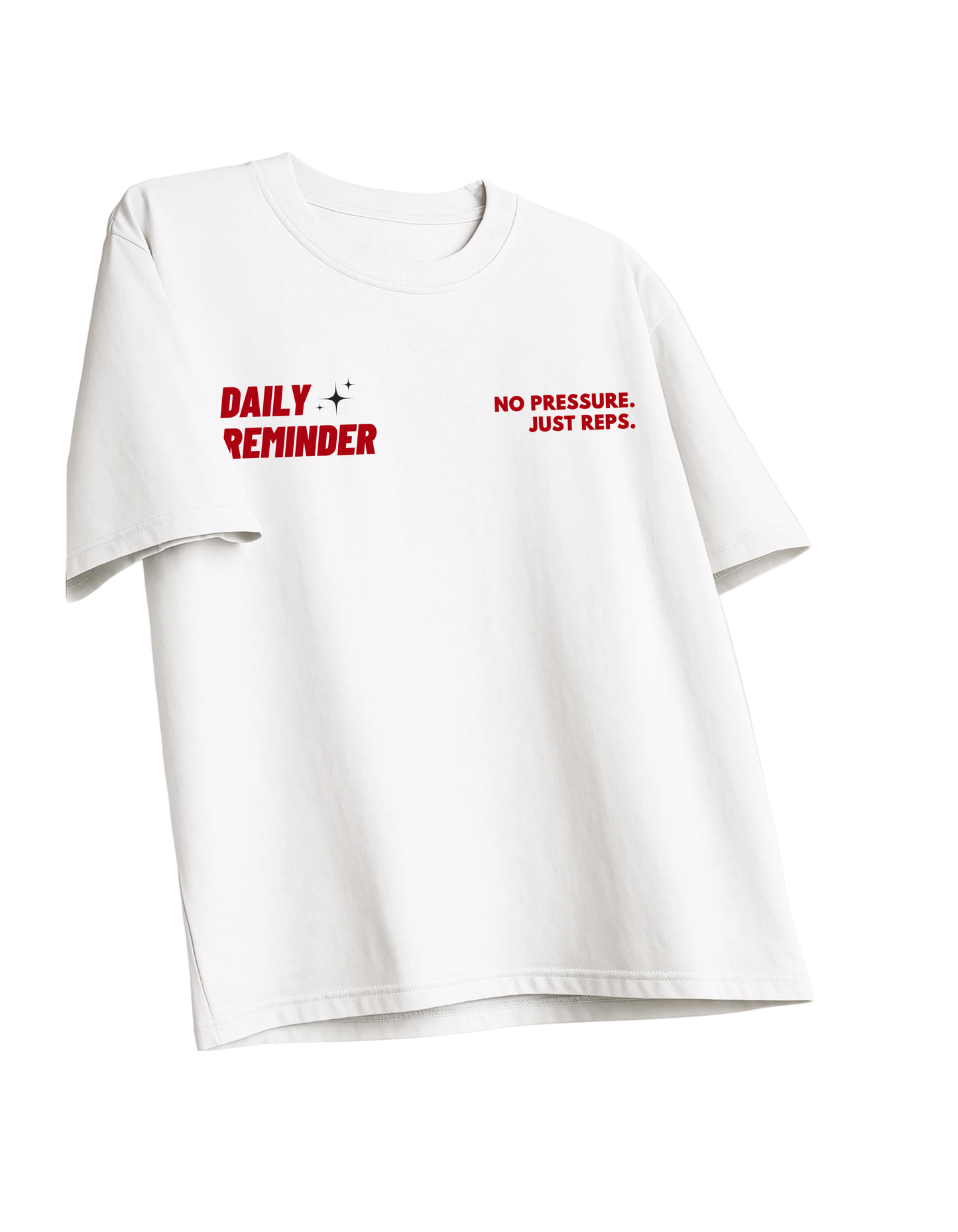White t-shirt with red text 'DAILY REMINDER NO PRESSURE. JUST REPS.' on a white background