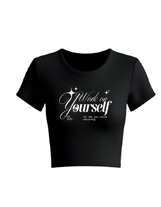 Black t-shirt with white text on a white background